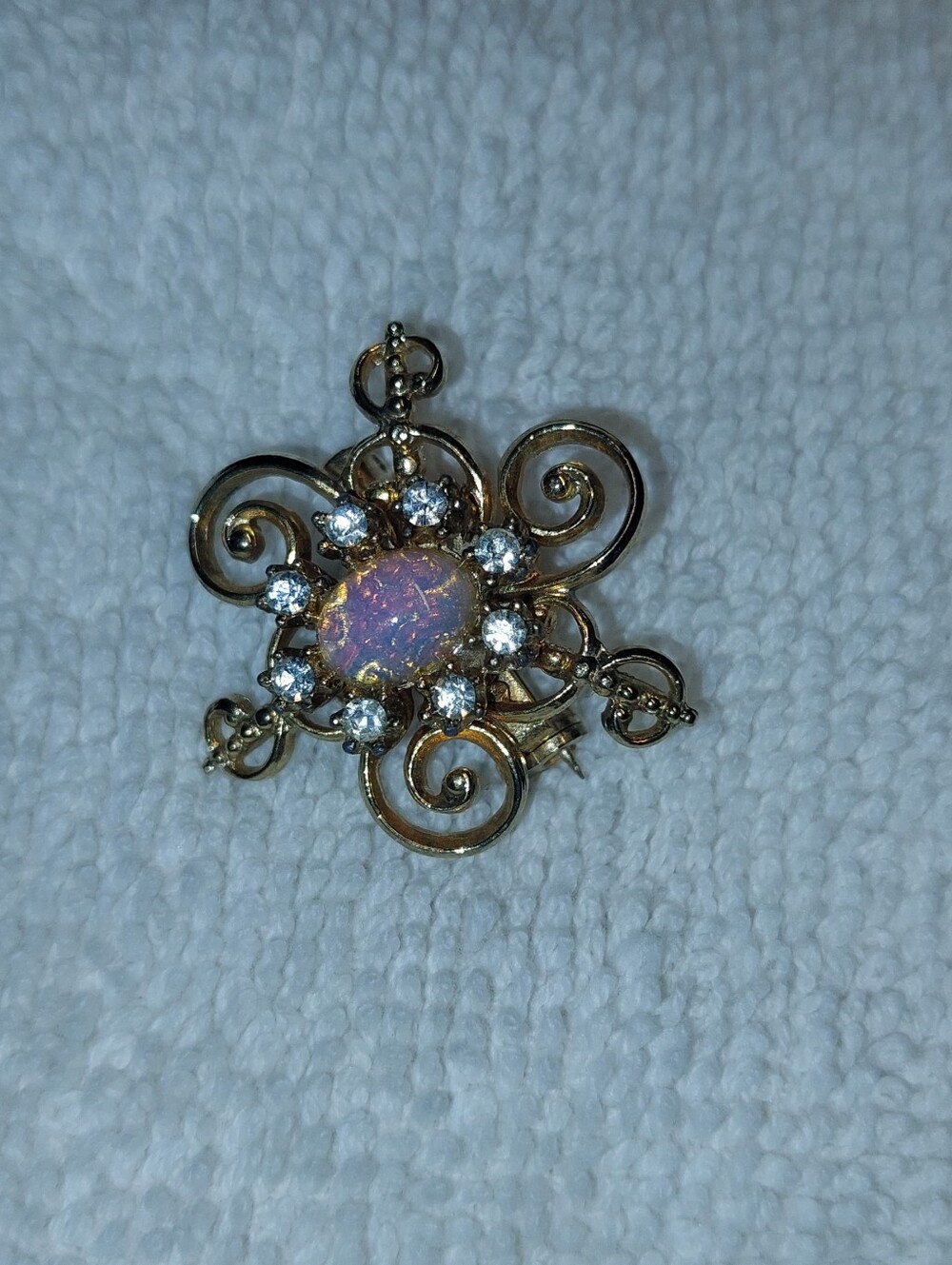 Gold Opal Floral Scroll Brooch with White Accents